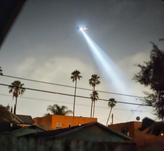 Police helicopter hovering over Echo Park